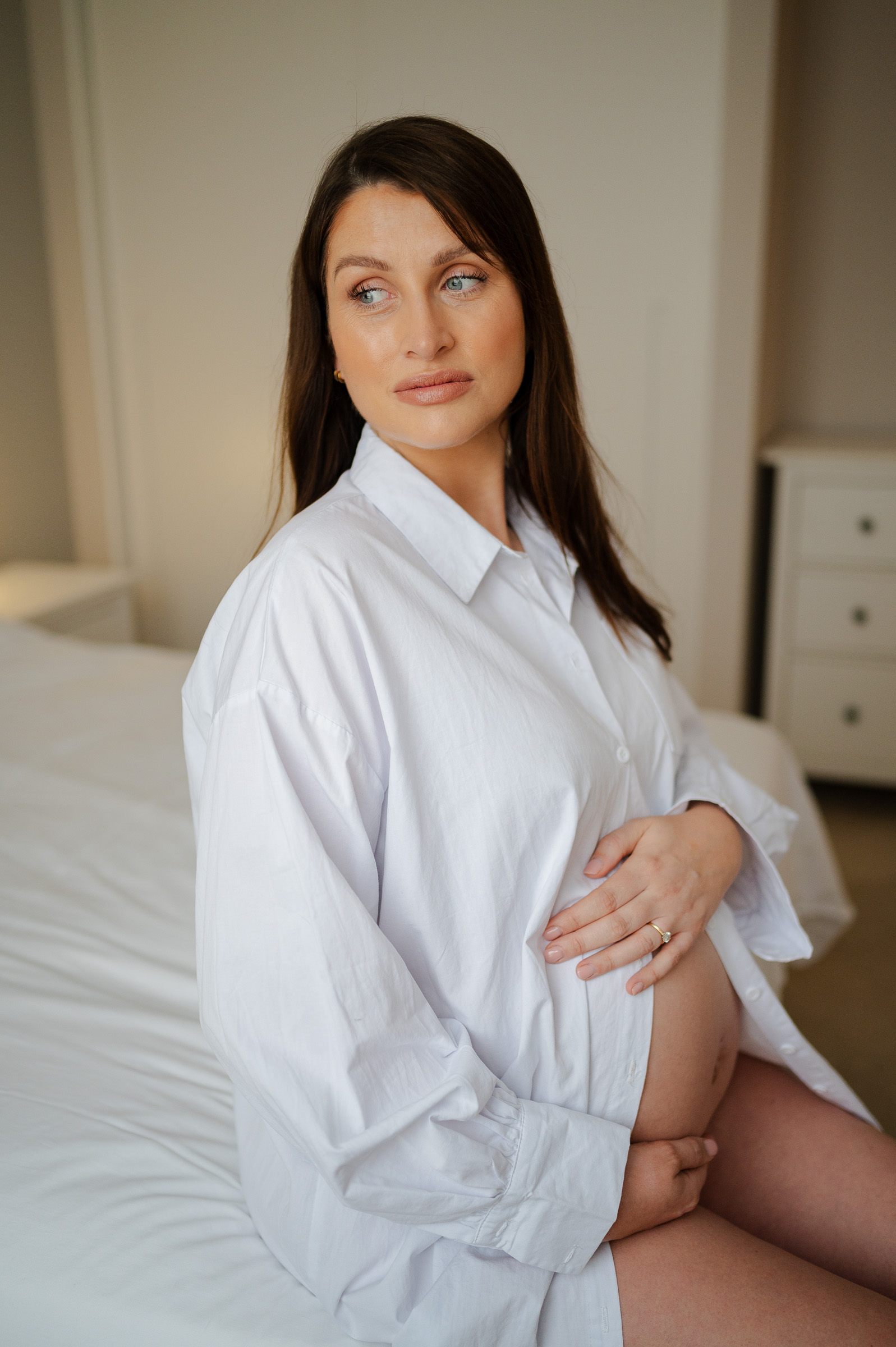 natural lighting floods into the bedroom with pregnant mum lauren