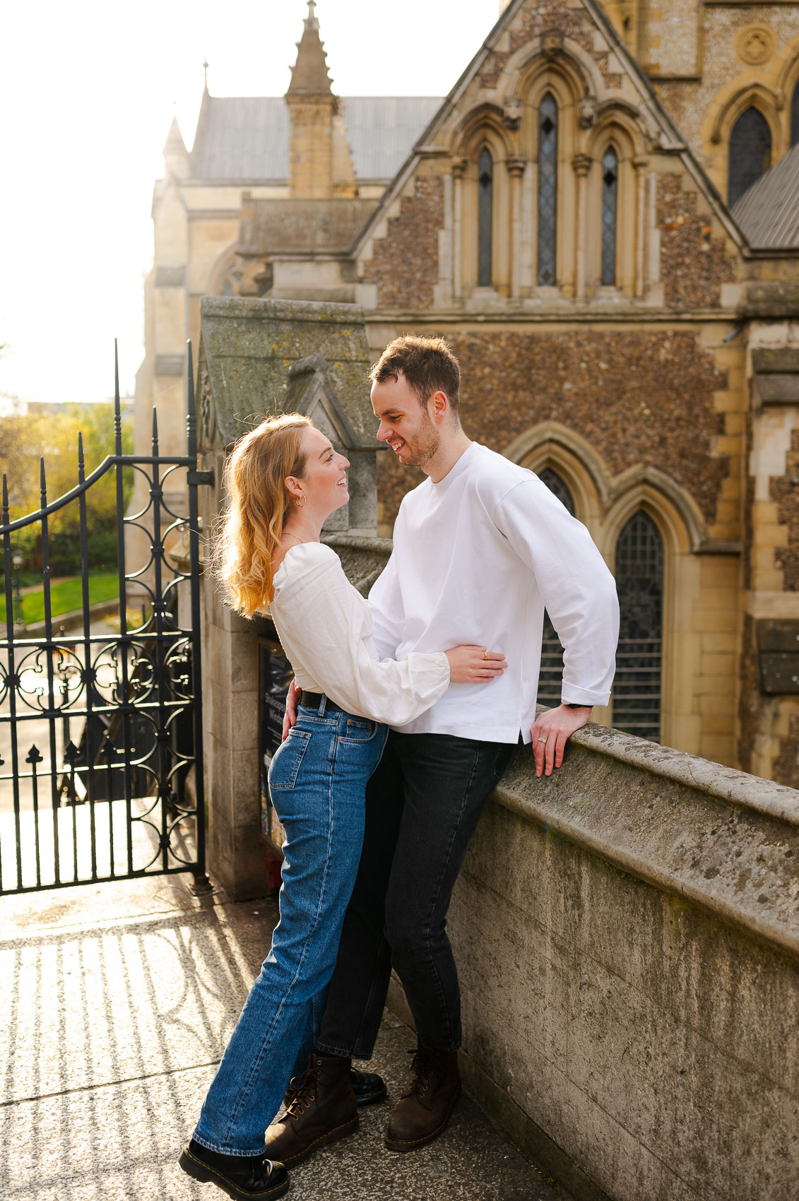 intimate couple in london posing for engagement photos